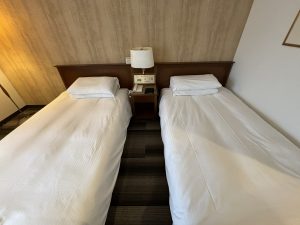 ホテル テラス ザ クレスト日立のベッドルームの写真
